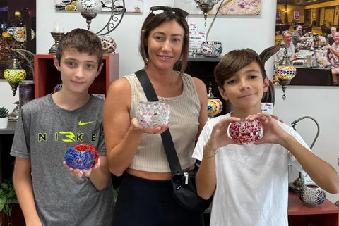 The Art of Thawing Sibling Rivalry: Learning Teamwork Through a Shared Light Project